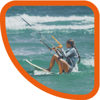 kitesurfer Girl water starting on the board